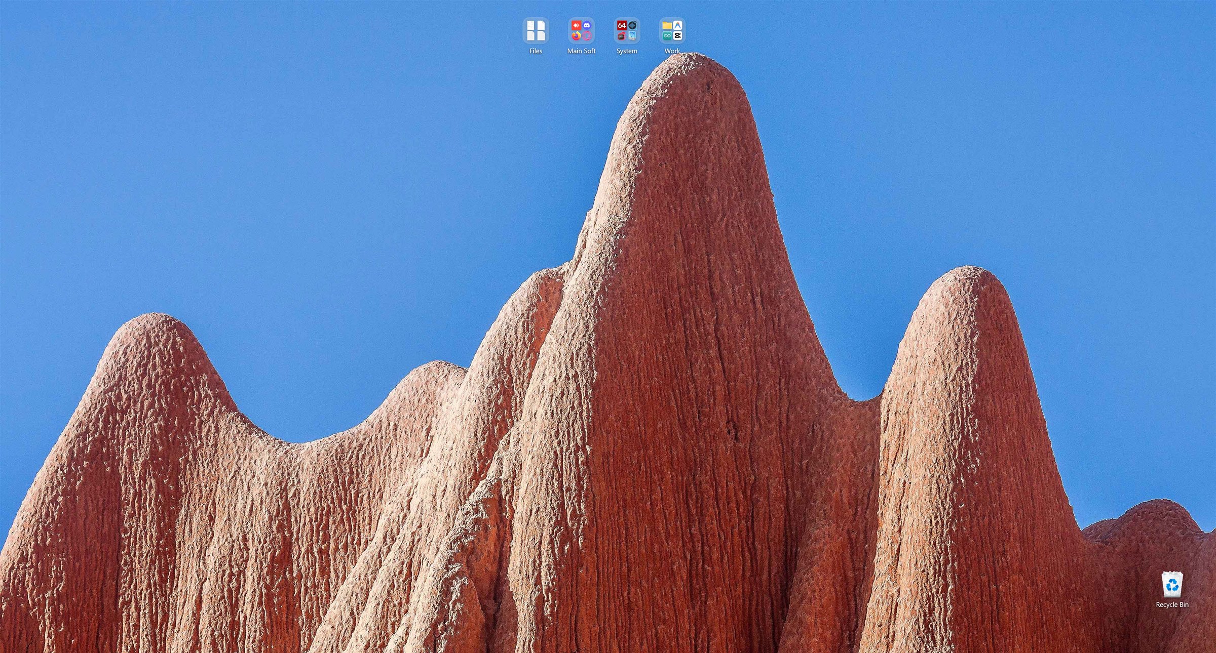 The same desktop in full: four groups near the top and nothing else in the way